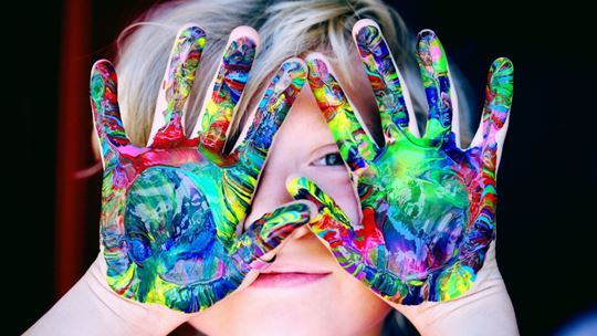 Autistic Foster Children with painted hands