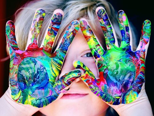 Autistic Foster Children with painted hands