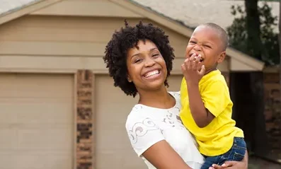 woman-holding-young-boy